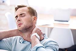 man with neck pain 